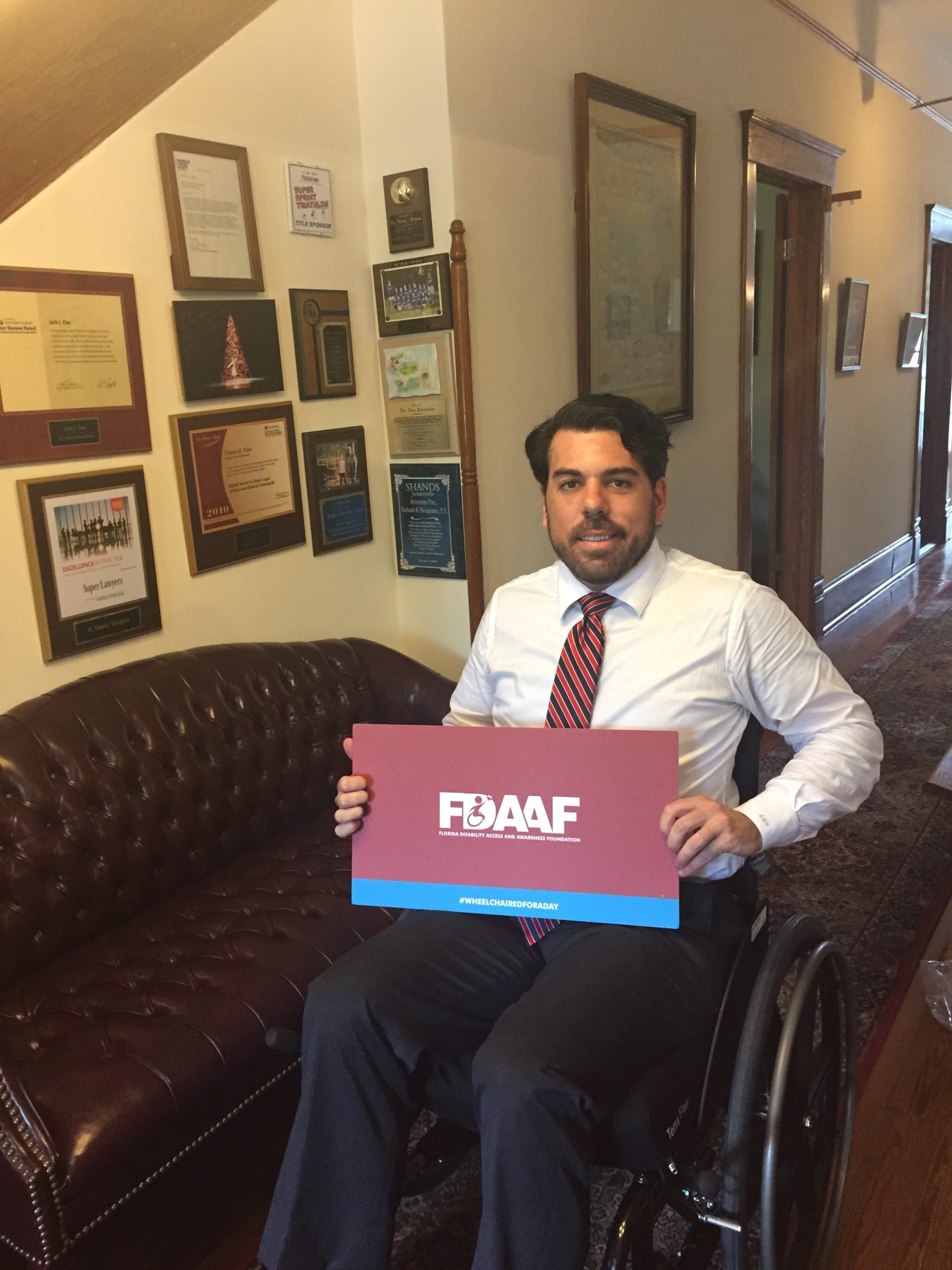 Dan Vasquez sitting in a wheelchair
